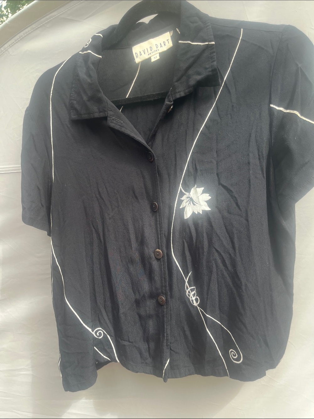 Black Short-Sleeve Button-Down Top with White Floral Stitching